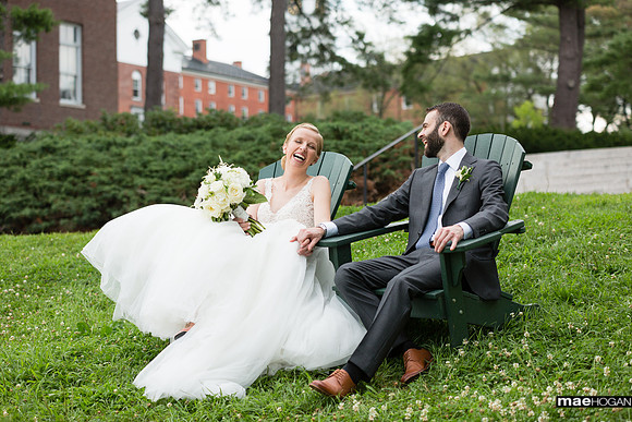 Bride and groom in adirondack chairs