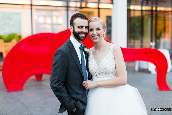 Bride and groom on the terrace at the Eric Carle Museum