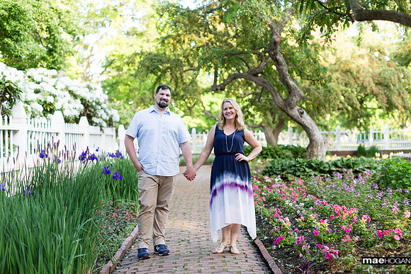 Engagement photo walk through Prescott Park formal garden